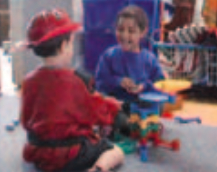 Two children playing with toys