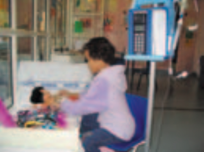 Child playing doctor and patient