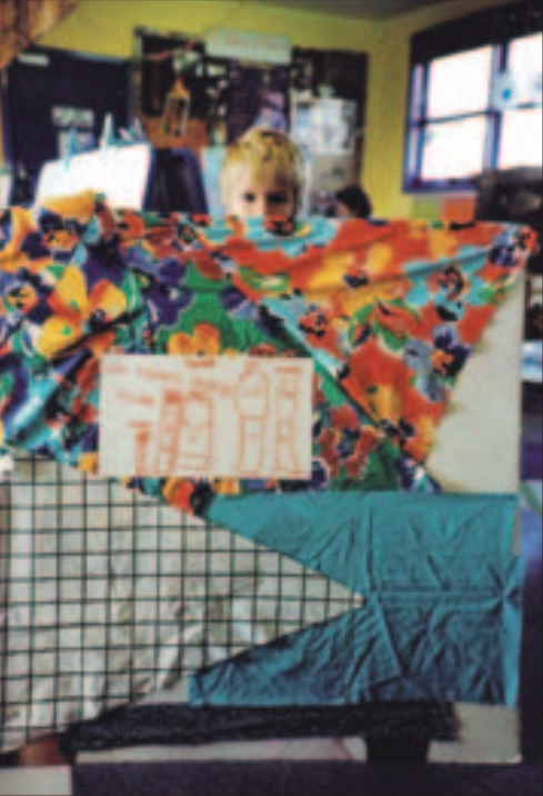 Child working with fabric