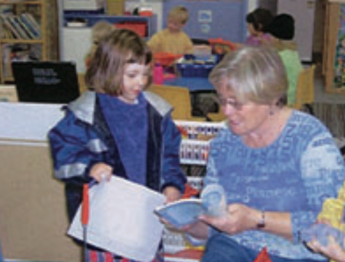 Teacher and child reading