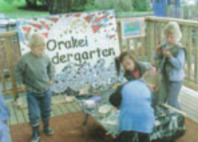 Children creating mosaic