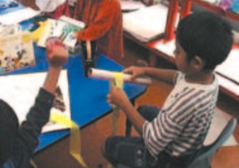 Child making kite