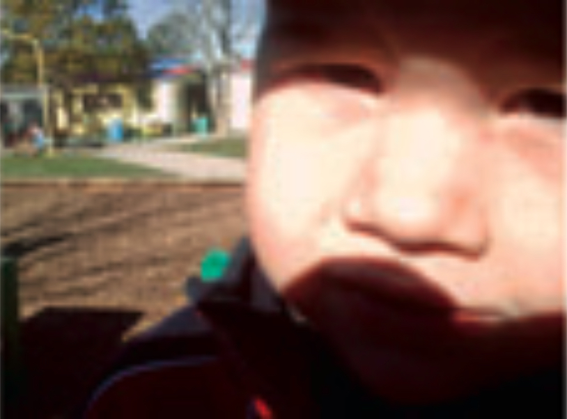 Close-up of child in playground