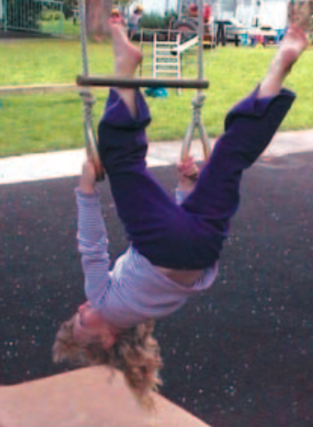 Child on trapeze