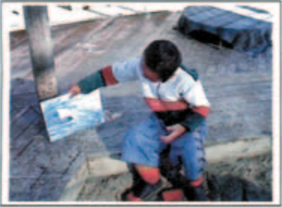 Boy holding a book
