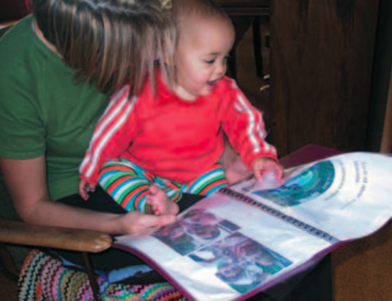 Teacher and infant reading