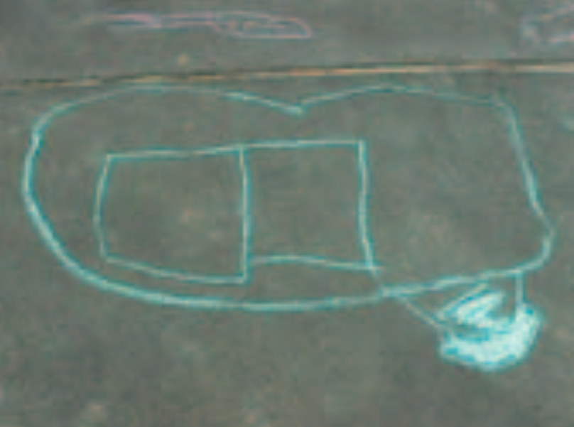 Child's chalk drawing of a car